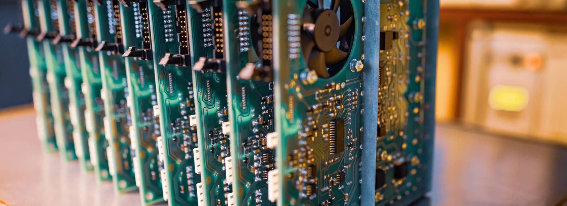 Close-up green embedded microcircuits are stacked in box to prepare for the further in factory for production of equipment